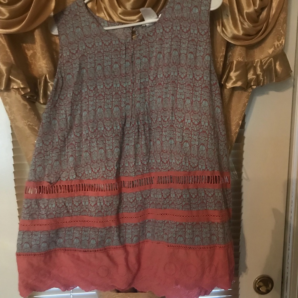 2 boutique sleeveless shirts